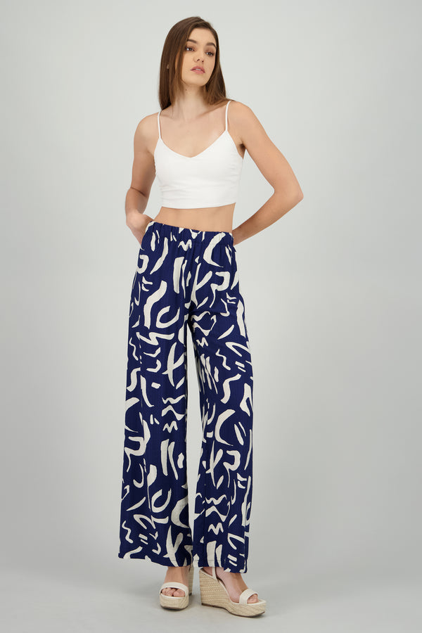 Pantalon fluido detalle estampado