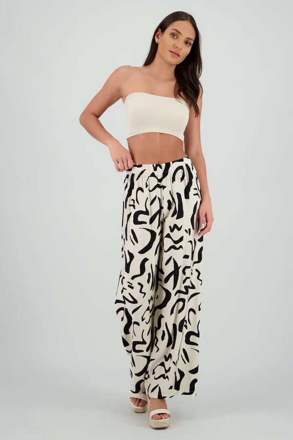 Pantalon fluido detalle estampado