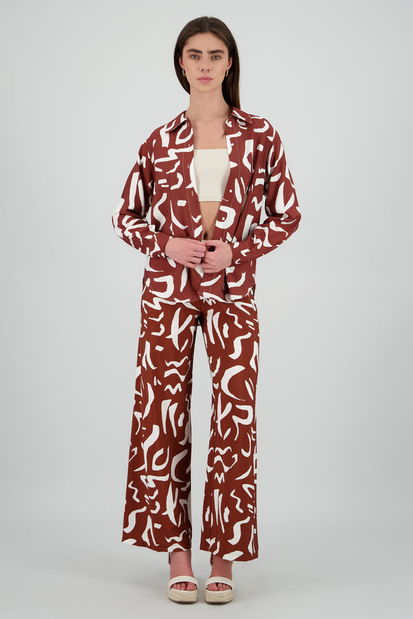 Pantalon fluido detalle estampado